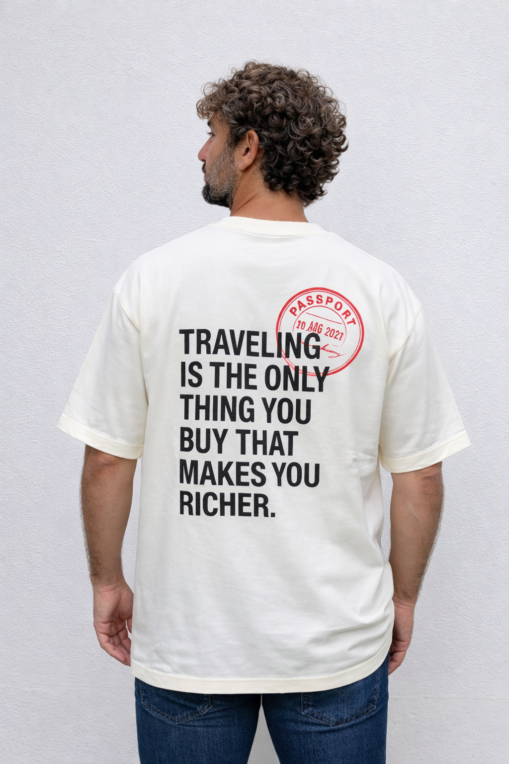 Camiseta “TRAVELING MAKES YOU RICHER”